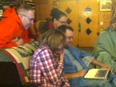 Jeremy Hyler, Penny Lew, Kathy Kurtze, and Troy Hicks work on a piece of writing at the 2013 CRWP Writing Retreat.